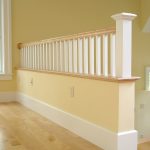Guardrail with square wood balusters and modified box newel.