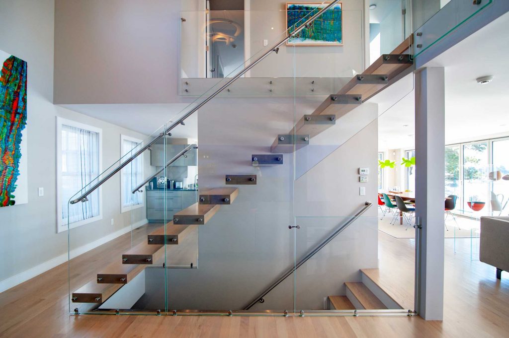 photo of marretti stair with floating treads and glass balustrade