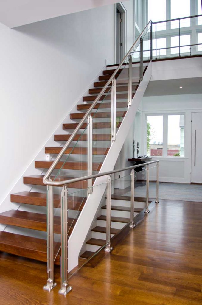 photo of Marretti stair floating treads, stainless, rail and glass panels